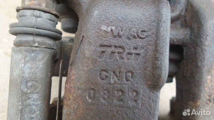 Суппорт тормозной задний правый Volkswagen Passat