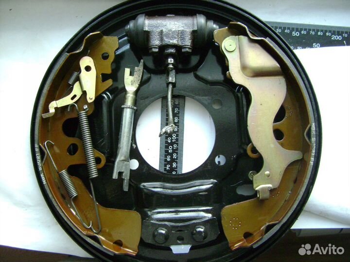 Щиток колодки цилиндр стояночный тормоз пружины