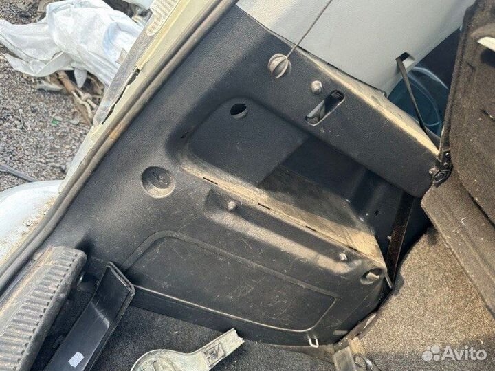 Обшивка багажника левая Skoda Roomster
