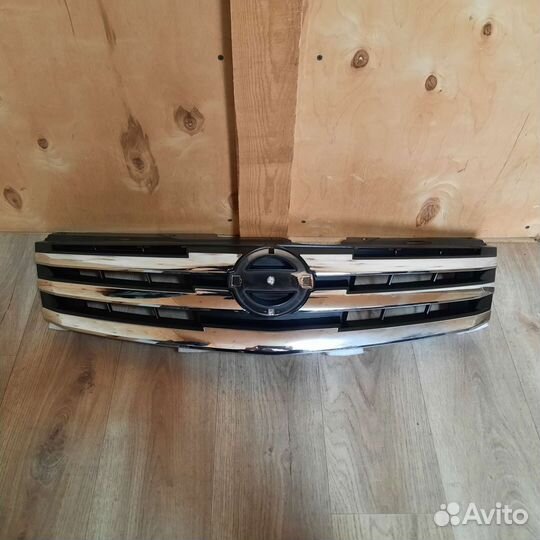 Решетка радиатора Nissan almera g15