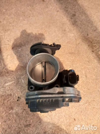 Дроссельная заслонка Пассат Б5 1.8т 058133063M