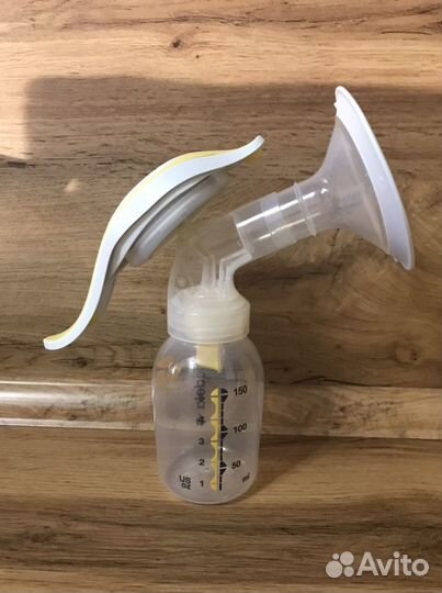 Молокоотсос ручной medela