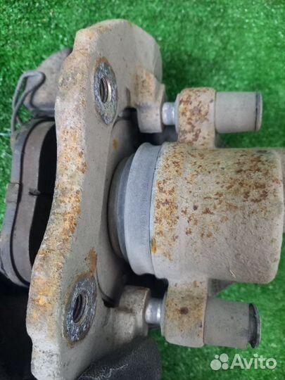 Суппорт тормозной передний левый Ford Focus DA3