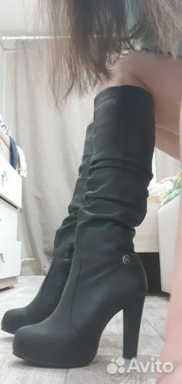Новые кожаные сапоги