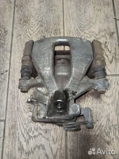 Суппорт тормозной задний Ford Transit 7 2011