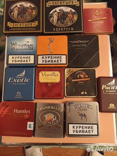 Коллекция пустых пачек металлических и картонных
