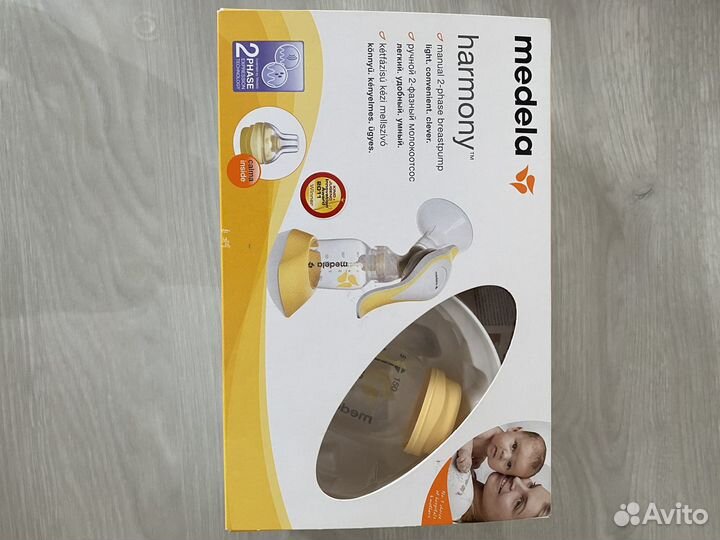 Молокоотсос medela ручной новый