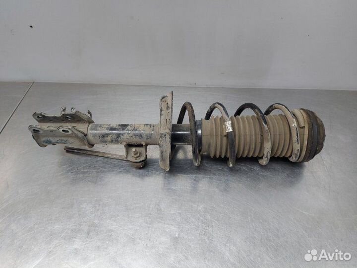 Стойка амортизатора передняя левая Opel Corsa D