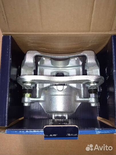 Суппорт тормозной перед левый Киа Рио 3, Солярис