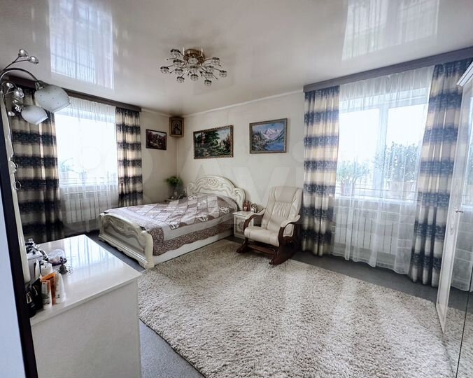 Коттедж 242 м² на участке 12,5 сот.