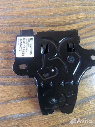 Замок крышки багажника на opel astra J