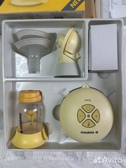 Молокоотсос medela электрический