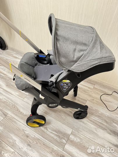 Коляска автокресло Doona с базой isofix