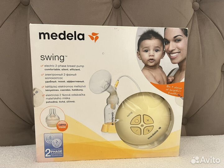 Молокоотсос medela swing электрический