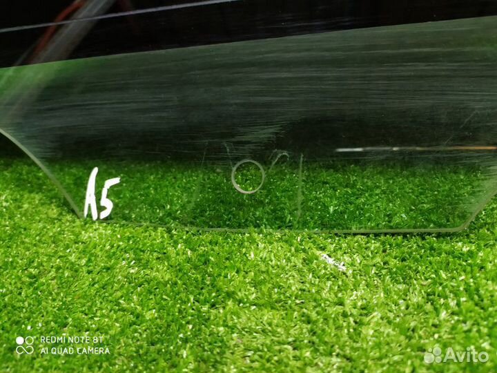 Стекло двери заднее левое Skoda Octavia A5