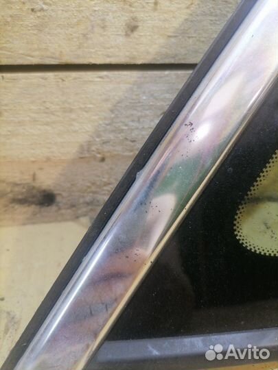Стекло глухое заднее левое Opel Astra J