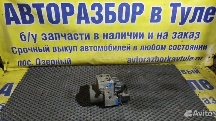 Блок управления ABS Opel Tigra