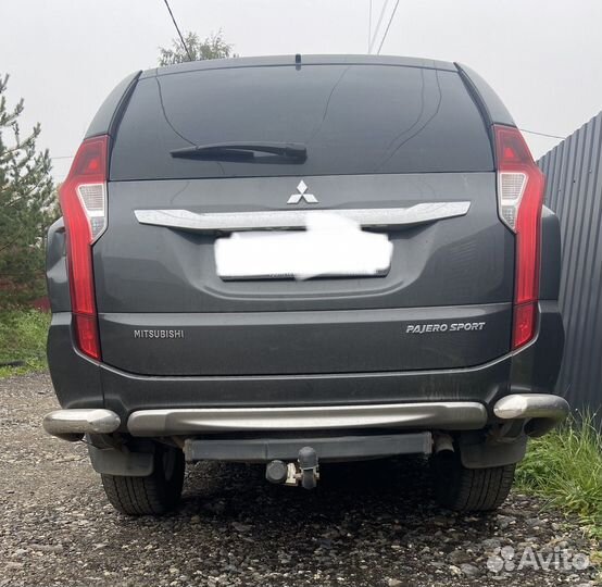 Защита заднего бампера на Паджеро Спорт 3