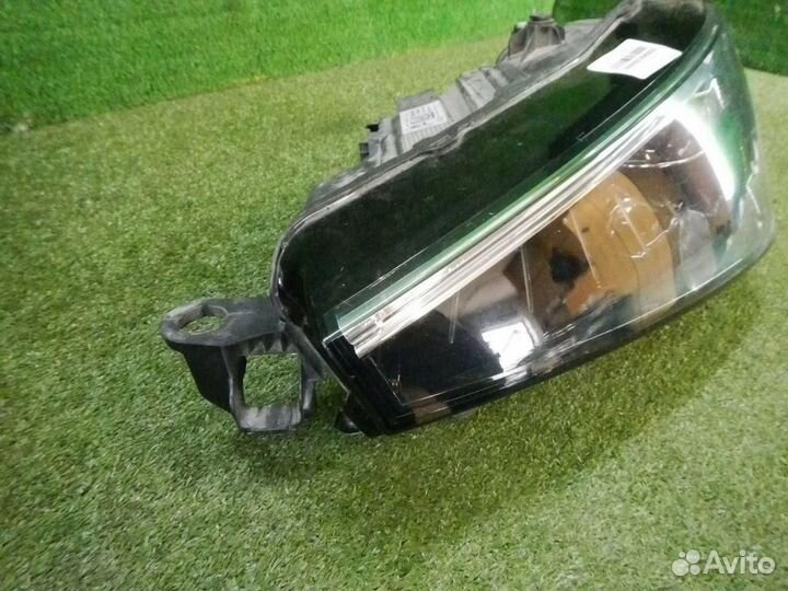 Фара левая Skoda Rapid