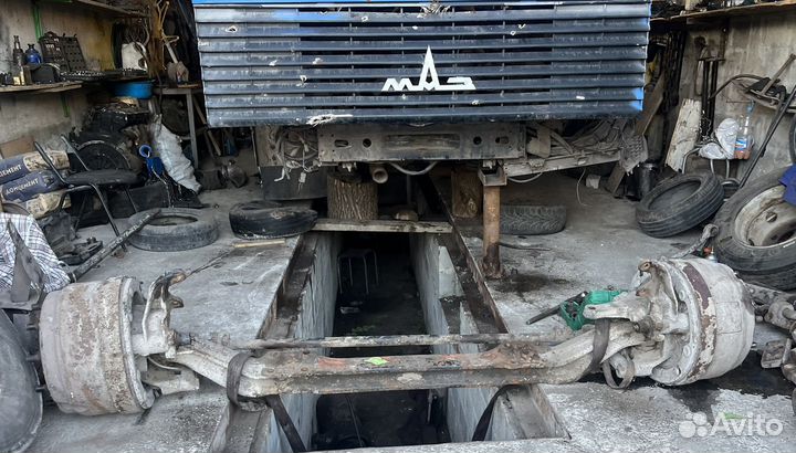 Балка в сборе со стипицами и барабанами на маз