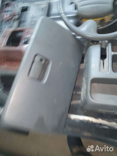 Бордочек торпеды на шевроле тракер 2001г