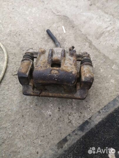 Суппорт задний левый Kia Magentis MS G4JP