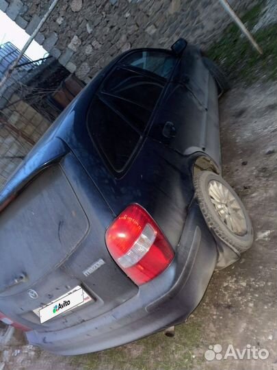 Mazda 323 1.5 МТ, 1999, 290 000 км