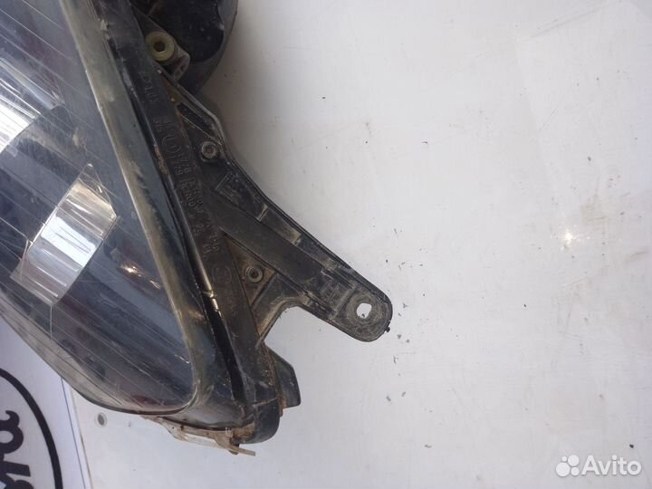 Фара левая Opel Astra H