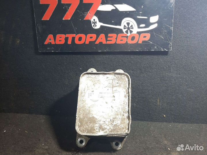 Радиатор масляный Skoda Octavia