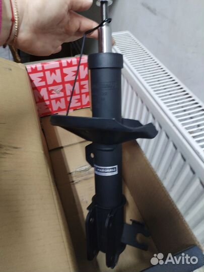 Передние стойки Лачетти