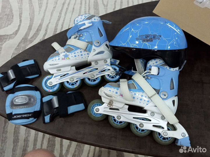 Роликовые коньки