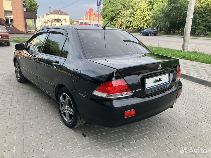 Mitsubishi Lancer 1.6 МТ, 2005, 180 000 км