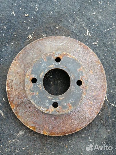 Тормозной диск передний Nissan March K12