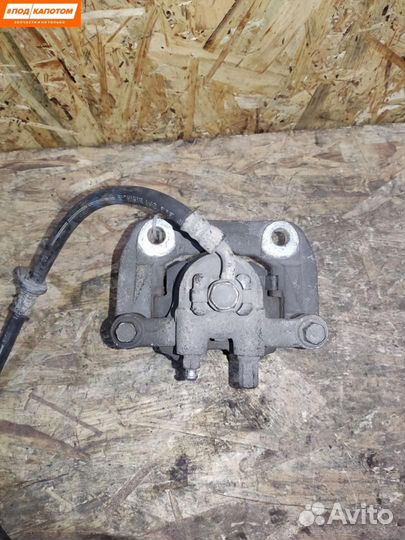 Суппорт тормозной задний левый Honda CR-V 3