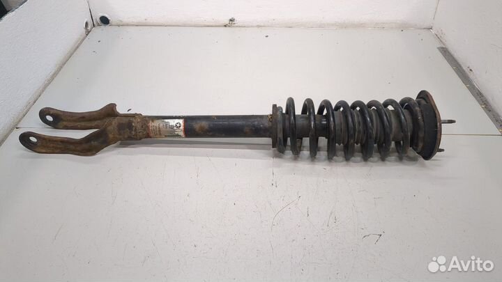 Амортизатор подвески левый передний Jeep Grand Cherokee