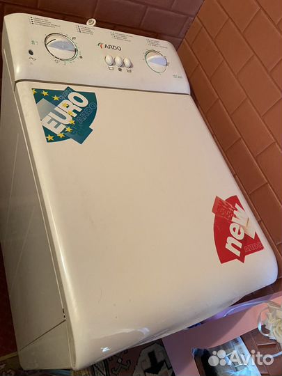 Стиральная машина с вертикальной загрузкой