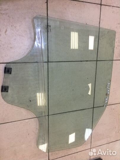 Стекло дверное заднее левое Renault Logan 1