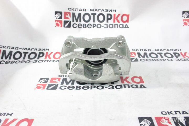 Суппорт тормозной передний левый Nissan X-Trail