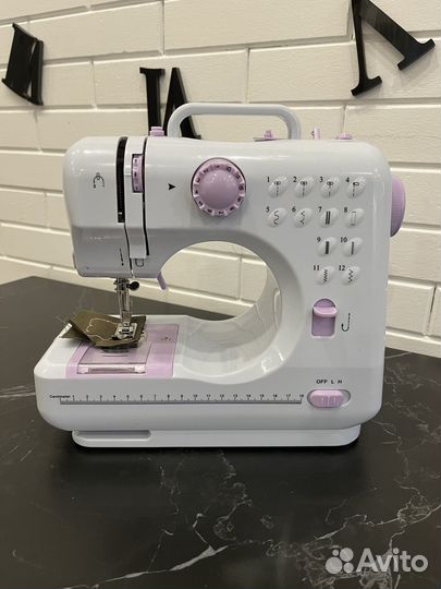Портативная швейная машинка
