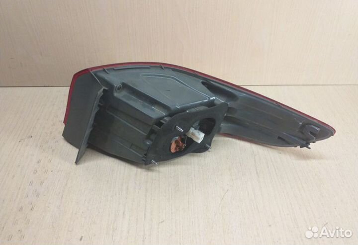 Фонарь левый внешний Kia Rio 3 седан