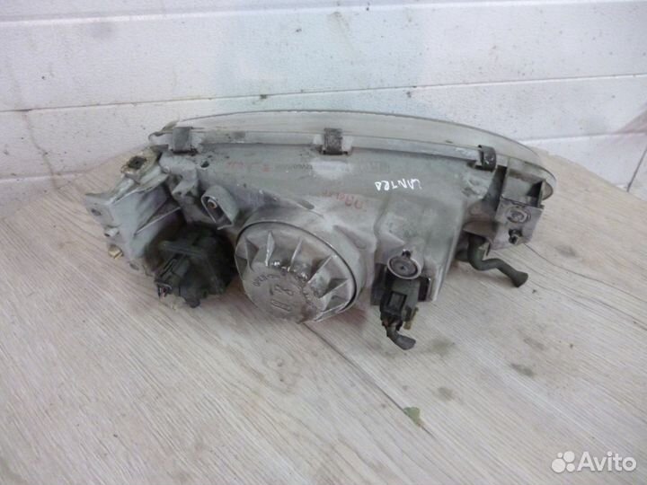 Фара передняя левая хундай лантра 2