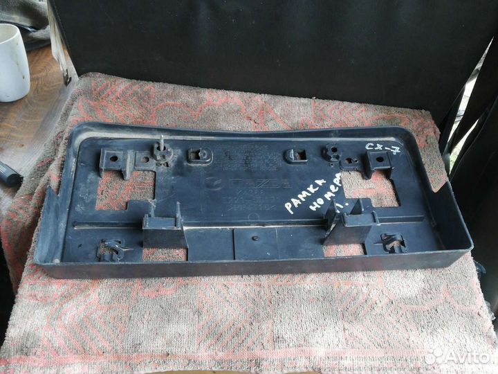 Панель крепления номерного знака Мазда CX-7