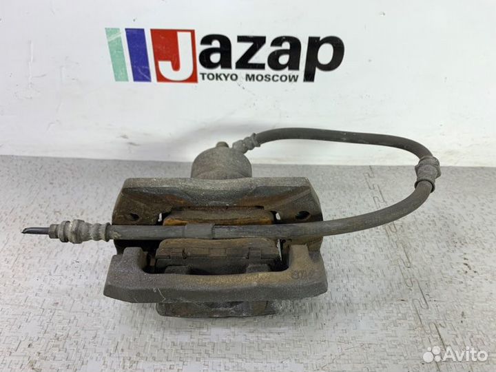 Тормозной суппорт задний левый Mazda Cx7 ER3P