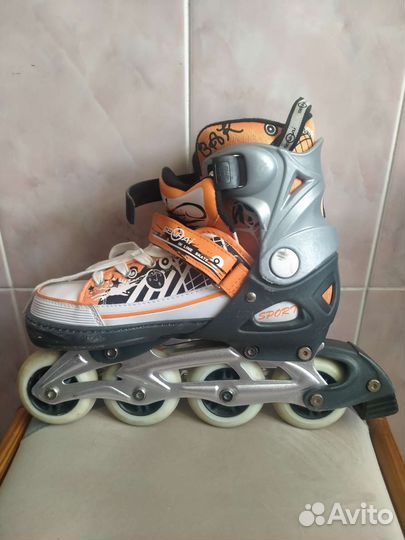 Роликовые коньки