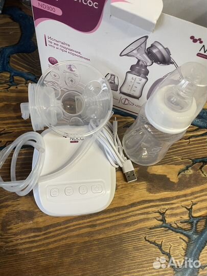 Молокоотсос электрический новый