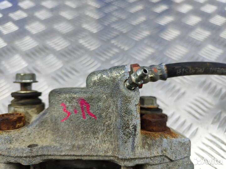 Суппорт задний правый Mitsubishi Pajero Sport 2