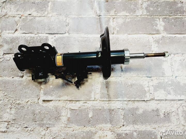 SRX Cadillac амортизатор передний 20953565 new