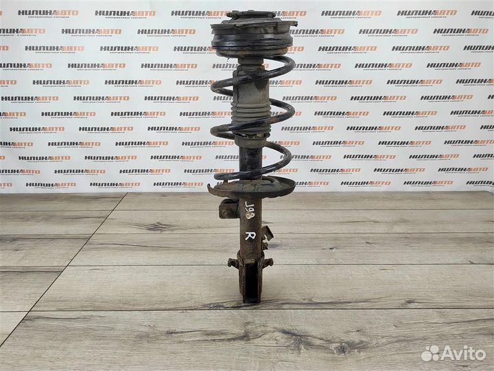Амортизатор передний правый nissan Note 1 E11