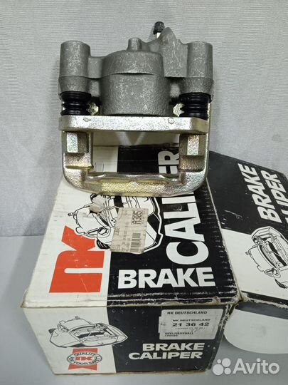 Тормозной суппорт Опель Кадет Е Вектра А