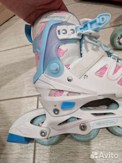 Роликовые коньки